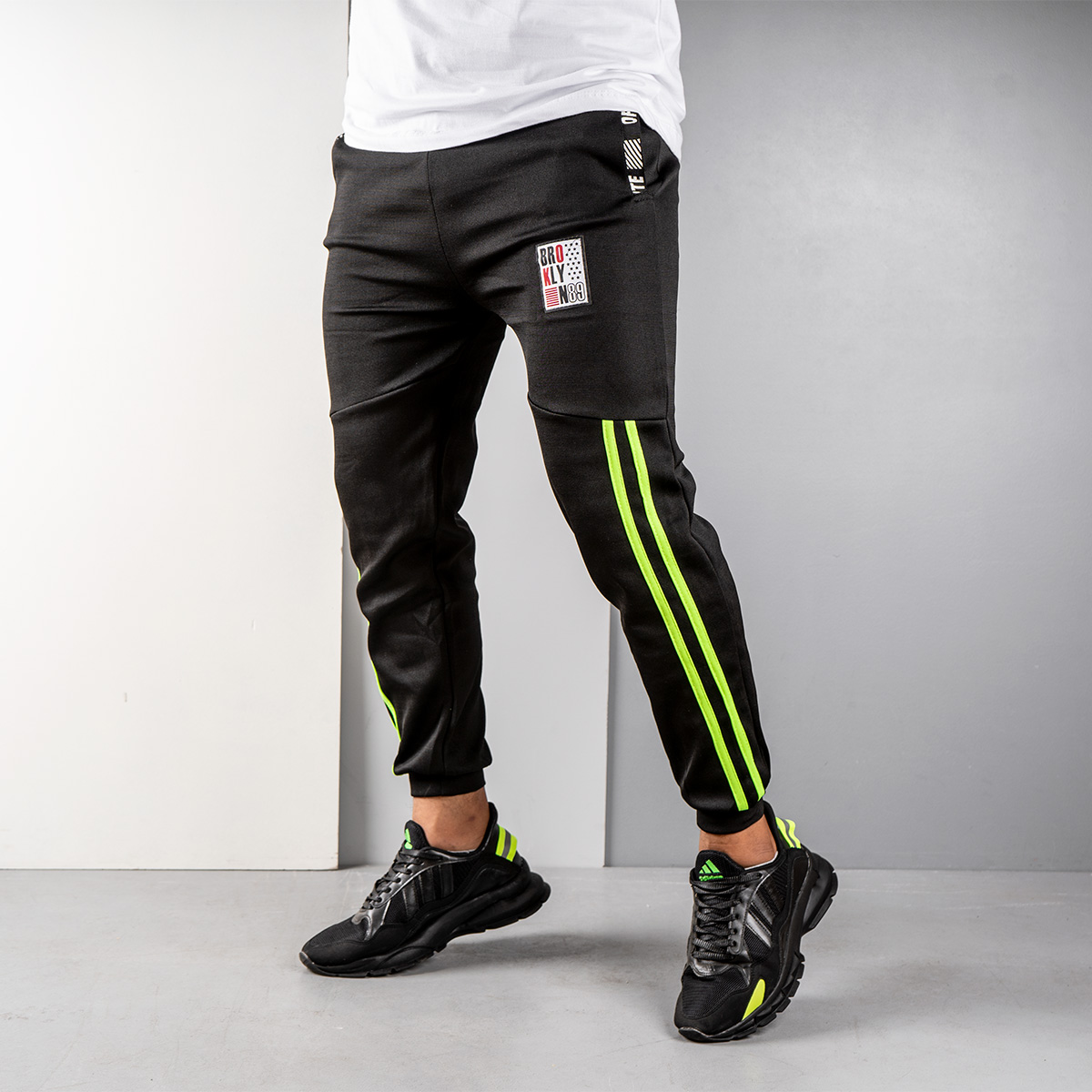 شلوار اسلش مردانه مشکی سبز مدل G52(T)